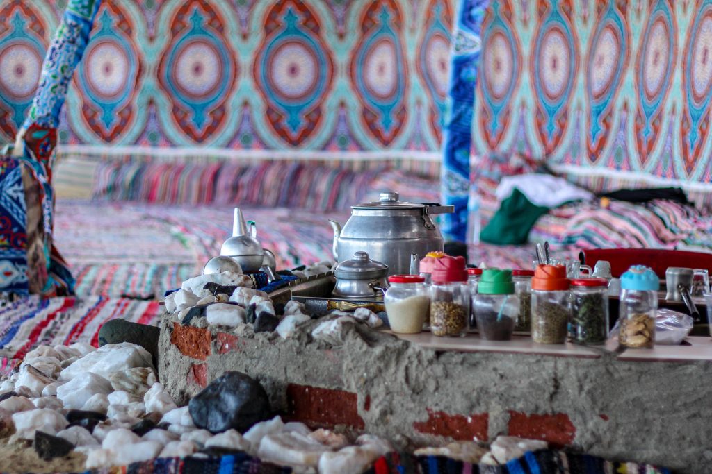 Tea being served in Cairo Desert, showcasing the rich cultural tradition of tea preparation in Egypt.