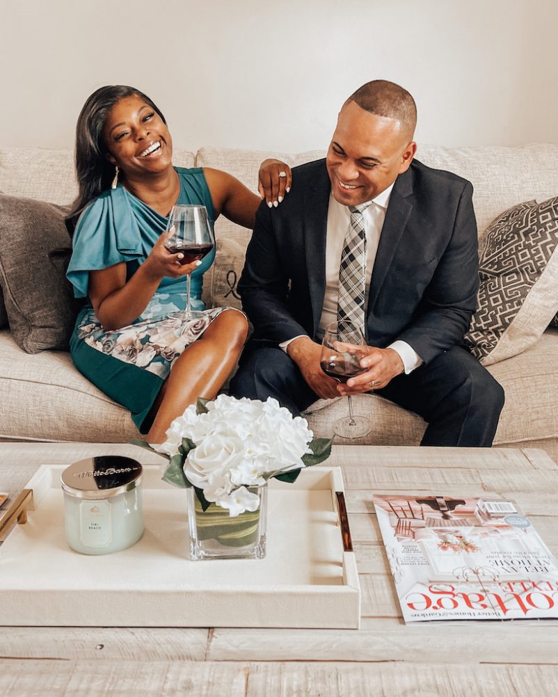 Amber Hurley and her husband enjoying a joyful moment together