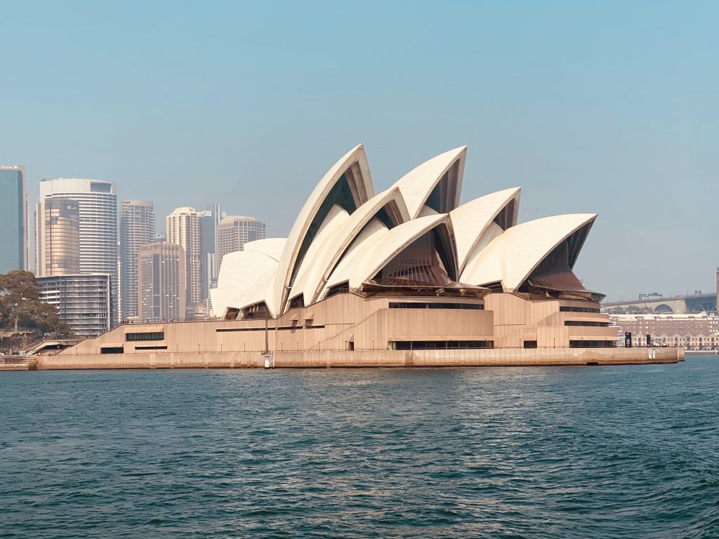 Sydney Opera House - Iconic modern architectural masterpiece located by Sydney Harbour with its sail-like structure.