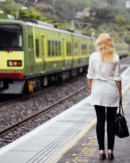 Train from Dublin traveling through picturesque countryside.