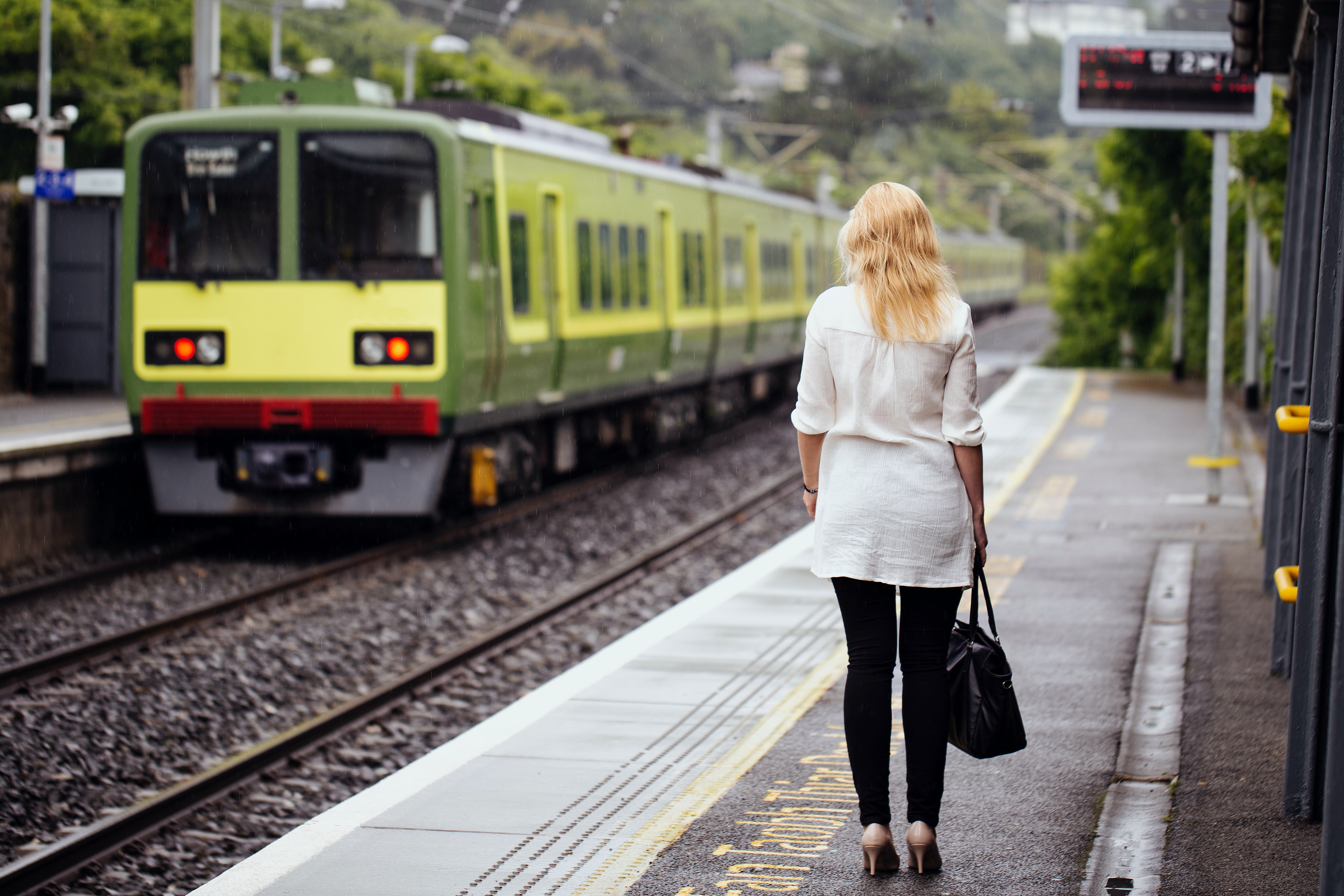 Train from Dublin traveling through picturesque countryside.