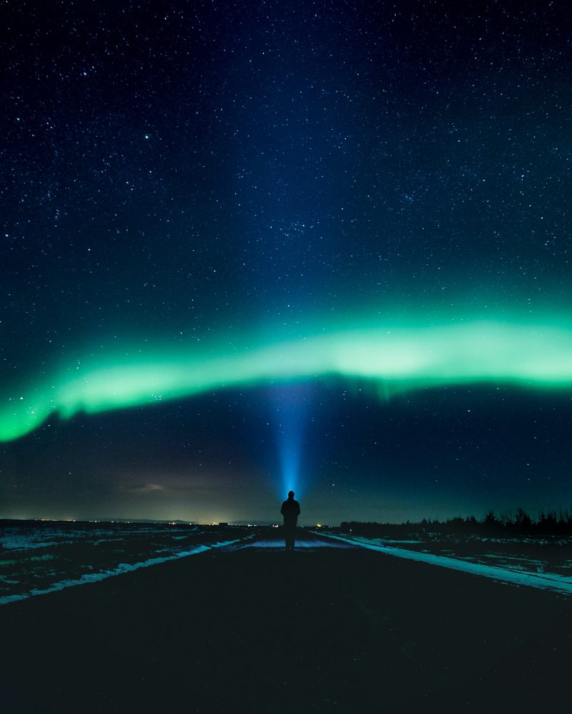 A captivating view of the Northern Lights painting the night sky with vibrant colors, a mesmerizing celestial phenomenon witnessed across 17 states.