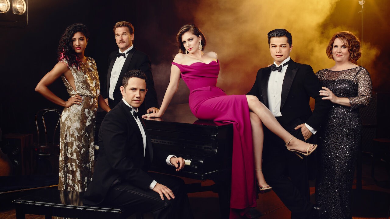 Image featuring the main cast of "Crazy Ex-Girlfriend" engaged in a lively musical number.